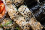 Vegetarian roll pieces topped with sesame